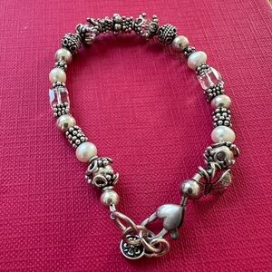 Elegant Silver Beaded Bracelet with Crystals and charming details